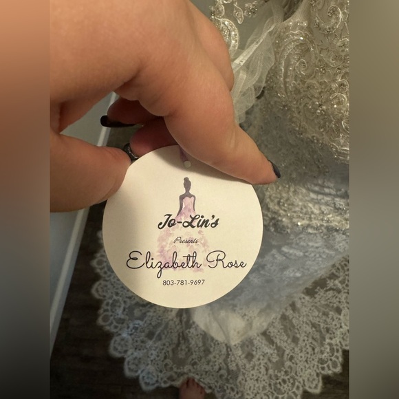 Beautiful brand new with tags Jasmine Couture wedding dress. Size 12. - Picture 7 of 10